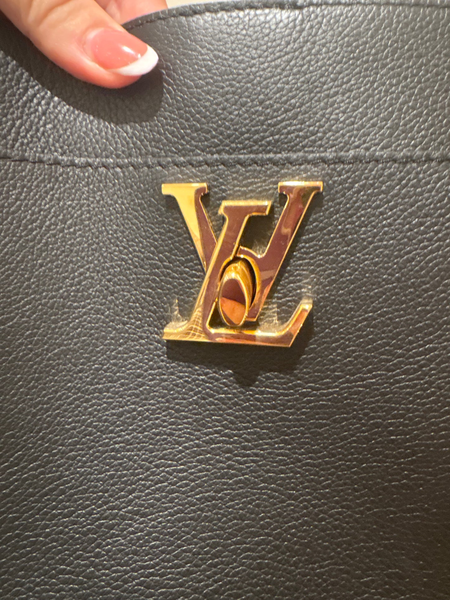 Lock and walk Lock me-  Louis Vuitton