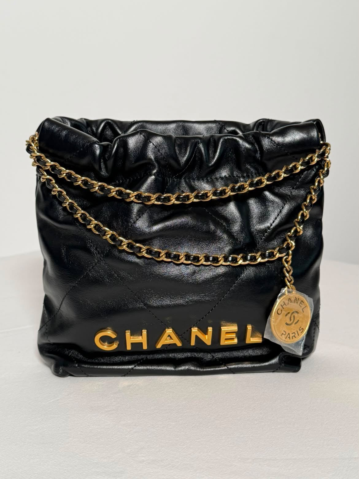 CHANEL 22 Mini Handbag – Black & Gold