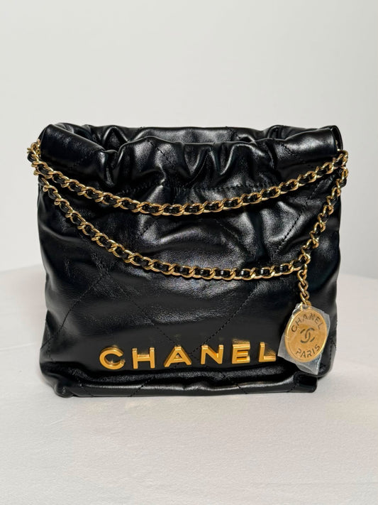 CHANEL 22 Mini Handbag – Black & Gold