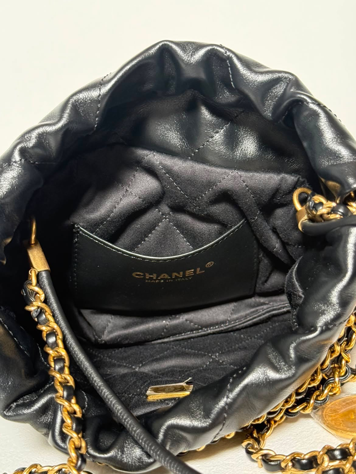 CHANEL 22 Mini Handbag – Black & Gold